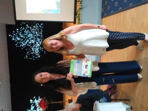 Cllr Carragher presents certificate to Sheila Gallagher